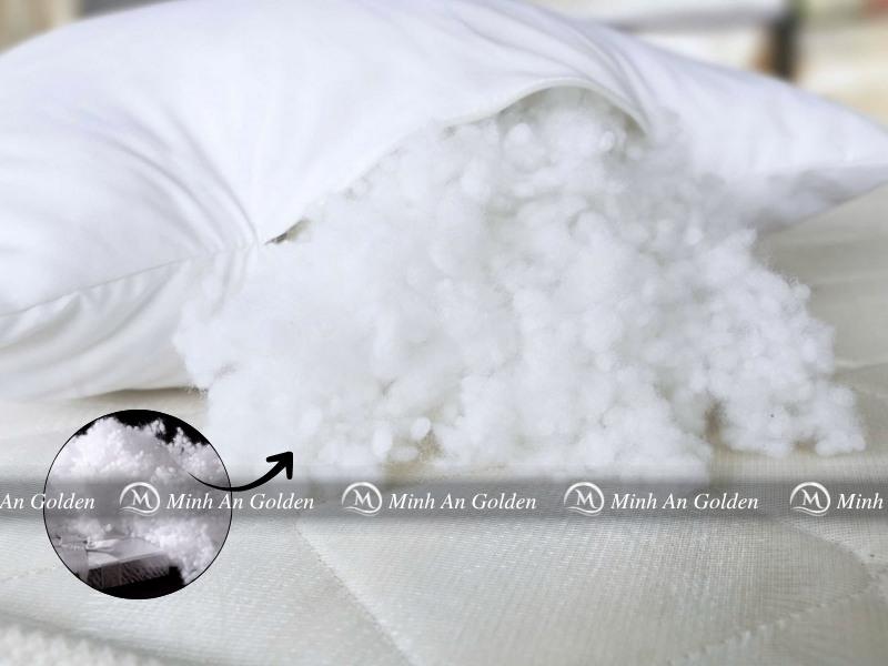 Cận cảnh ruột gối bông hạt với cấu trúc hạt tròn li ti giúp gối luôn phồng và đàn hồi tốt Cận cảnh ruột gối bông hạt với cấu trúc hạt tròn li ti giúp gối luôn phồng và đàn hồi tốt